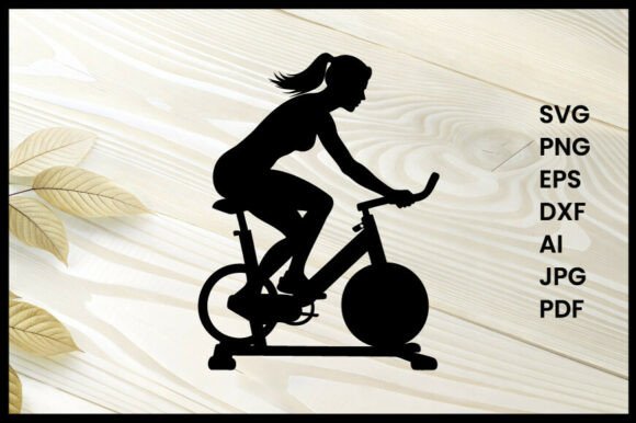Woman Cycling on Stationary Bike